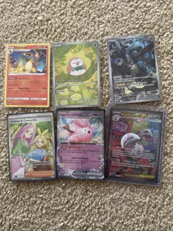 Nintendo Pokemon TCG 17-Card Lot Charizard Rowlet Zekrom Holo Foil 2025 - Image 1