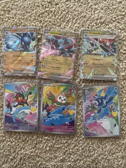 Nintendo Pokemon TCG 17-Card Lot Charizard Rowlet Zekrom Holo Foil 2025 - Image 2