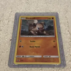 Pokemon TCG Rockruff SM Black Star Promo SM06 Holo Promo Cosmos - Image 1