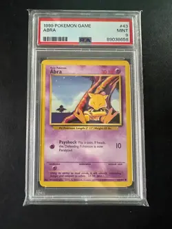 1999 Pokemon Base Set Abra Unlimited #43 PSA 9 - Image 1