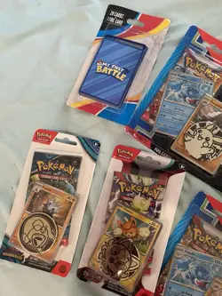 7 Pc Sealed Pokemon TCG Card Packs Collection with Coin and Mini Tin Bundle - Image 3