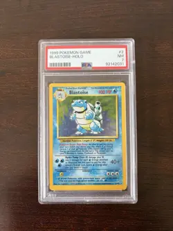 1999 POKEMON GAME 2 BLASTOISE-HOLO PSA 7 - Image 1