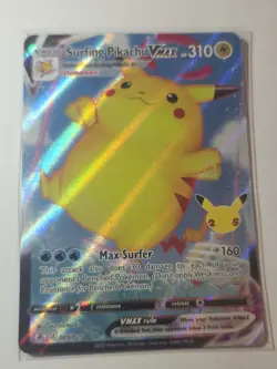 Pokemon Surfing Pikachu VMAX 009/025 Celebrations Ultra Rare Holo Card - Image 1