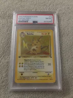 1999 Pokemon Fossil 1st Edition #14 Raichu-Holo PSA 8 - Image 1
