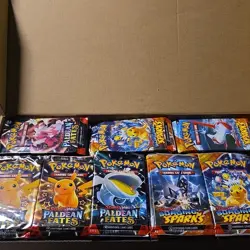 Pokemon Paldean Fates & Surging Sparks Booster Packs (Already opened) - Image 1