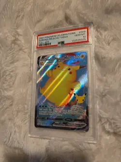 2021 POKEMON CELEBRATIONS #009 FULL ART/SURFING PIKACHU VMAX PSA 10 - Image 1