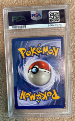 1999 Pokemon Fossil Hitmonlee Holo PSA 7 - Image 2