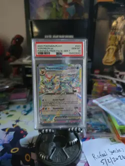 2025 POKEMON PLAY! POKEMON PRIZE PACK: SERIES 7 #023 VAPOREON EX PSA 10 - Image 1