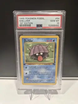 1999 POKEMON FOSSIL 1ST EDITION #54 SHELLDER PSA 10 - Image 1