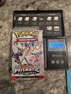 22.39g! HEAVY! -Pokemon Prismatic Evolution Booster Pack -Possible GODU - Image 1
