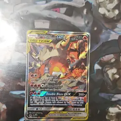 *RELIST FOR LESS*Pokemon Reshiram & Charizard GX TAG TEAM SM201 Promo Holo Card - Image 1