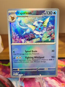 Vaporeon (Poke Ball) - 022/131 - Pokemon Prismatic Evolutions Rare NM - Image 1