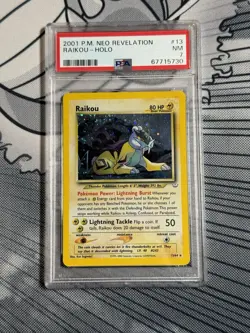 2001 POKEMON NEO REVELATION 1ST ED #13 RAIKOU-HOLO PSA 7 - Image 1