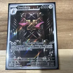 The Pokemon Company Doublade Stage 1 Holo POR 098/088 English 100 HP 60 Attack - Image 1