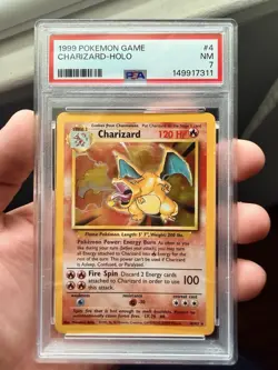 1999 Pokemon Charizard Base Set Holo Rare Card 4/102 PSA 7 Near Mint - Image 1