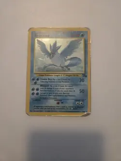 Pokemon Articuno Fossil Holo Card 2/62 Unlimited Heavy play - Image 1