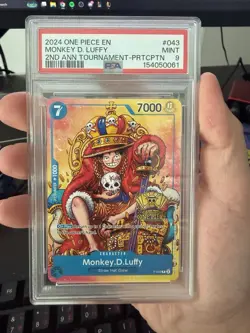 One Piece CCG Monkey.D.Luffy 2nd Anniversary Tournament Participant PSA 9 - Image 1
