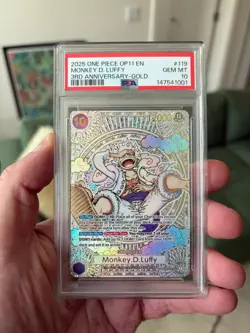 2025 ONE PIECE MONKEY D. LUFFY GOLD OP11 A FIST OF DIVINE SPEED EN #119 PSA 10 - Image 1