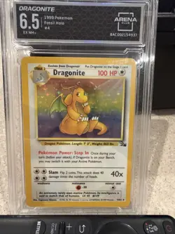 1999 POKEMON FOSSIL #4 DRAGONITE-HOLO - Image 1