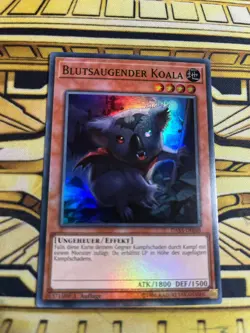 Yugioh Blutsaugender Koala DASA-DE048 Super Rare - Image 1