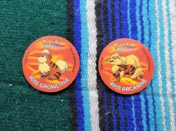 VTG Pokemon Tazo Growlithe And Arcanine 2000 Nintendo Lays Cheetos Pogs - Image 1