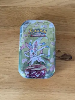 Pokemon TCG Mini Tin Boosters Scarlet & Violet Prismatic Evolutions Sylveon - Image 1