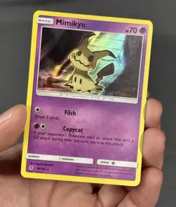 Mimikyu 58/145 Holo SM - Guardians Rising - Pokemon Card - NM - Image 1