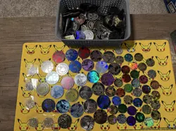 Assorted Pokemon TCG Coin Lot 250 Count - Charizard, Pikachu, Mewtwo, Rayquaza - Image 1