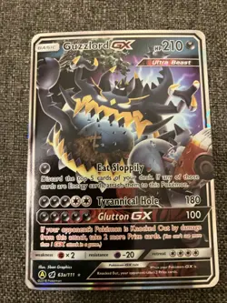 Pokemon Guzzlord GX 63a/111 Alternate Art Promo Holo Card Crimson Invasion - Image 1