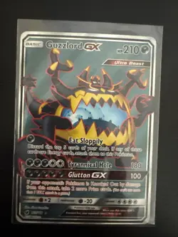 2017 POKEMON SUN & MOON CRIMSON INVASION 105 FULL ART/GUZZLORD GX - Image 1