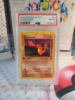 Charmander 1st Edition Pokemon Team Rocket PSA 8 #50 - Image 1