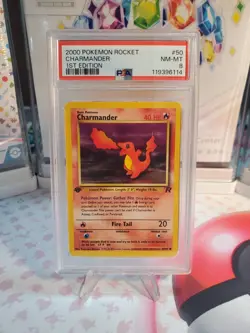 Charmander 1st Edition Pokemon Team Rocket PSA 8 #50 - Image 1