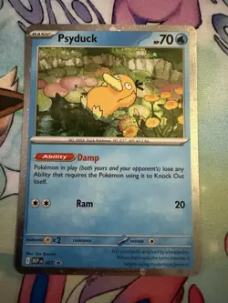 Pokemon TCG Psyduck 007 Me: Mega Evolution Black Star Promo Cosmos Holo Card - Image 1