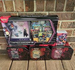 BRAND NEW-Pokemon TCG: Team Rocket Tins Set/Booster Bundle/Cynthia Garchomp Box - Image 1