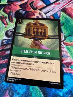 STEAL FROM THE RICH FOIL LORCANA DISNEY TCG THE FIRST CHAPTER CARD MINT ENG - Image 1