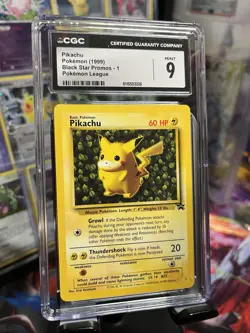 CGC 9 MINT Pikachu 1999 Black Star Promos 1 Pokemon League Pokemon Card - Image 1