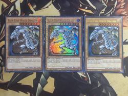 Yugioh: 3x Blue-Eyes White Dragon Ultra Rare Holo 1st Edition Playset Alt Art NM - Image 1