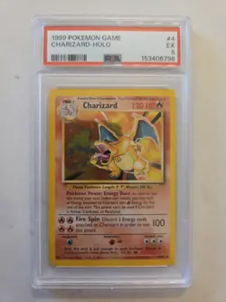 1999 Pokemon Unlimited Charizard Rare Holo #4/102 PSA 4 - Image 1
