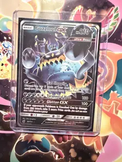 Guzzlord GX 63/111 Holo GX Rare Crimson Invasion Pokemon Lightly Played - Image 1