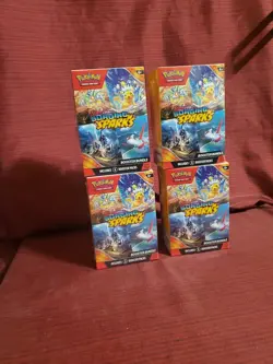 Pokemon Surging Sparks Booster Bundle Factory Sealed (x4) TCG - Image 1