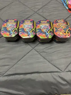 Pokemon TCG Mega Charizard EX Tins Set of 4 (3X & 1Y) FACTORY SEALED - Image 1