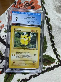 1999 Pokemon TCG Jungle Pikachu 60/64 Unlimited CGC 9 Mint w/ Subgrades - Image 1