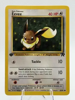 POKEMON EEVEE 55/82 1ST EDITION TEAM ROCKET LP - Image 1