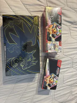 Pokemon Prismatic Evolutions Booster Surprise Box Charizard Eevee 3 Boxes - Image 1