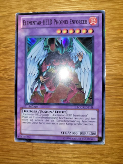 Elementar-Held Phoenix Enforcer LCGX-DE138 Super-Rare 1. Auflage YU-GI-OH - Image 1