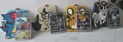 Pokemon Chinese exclusive keychains with sealed promo cards - Image 1
