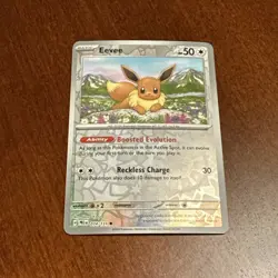 Eevee NM 074/131 Prismatic Evolutions Pokemon TCG Reverse Holo - Image 1
