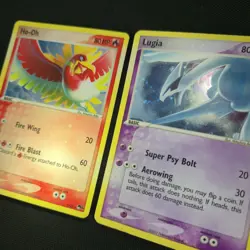 BLEED ERROR SWIRL Lugia 2/17 Ho-Oh 1/17 EX Pop Series Cosmos Holo Pokemon Card - Image 1