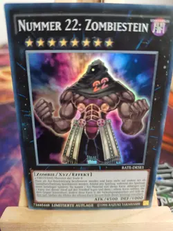 Nummer 22: Zombiestein RATE-DESE1 Super Rare DE NM YUGIOH - Image 1