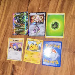 Pokemon Card Lot with Tins, Coins, Lycanroc GX, Scizor EX, Pikachu, Solgaleo - Image 4